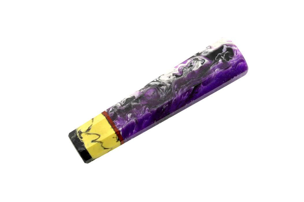 The Custom Wa-Handle #625 - 132mm (Standard) by Made in Turkey is a cylindrical epoxy knife handle with marbled purple, black, white, and yellow segments, displayed against a plain white background.