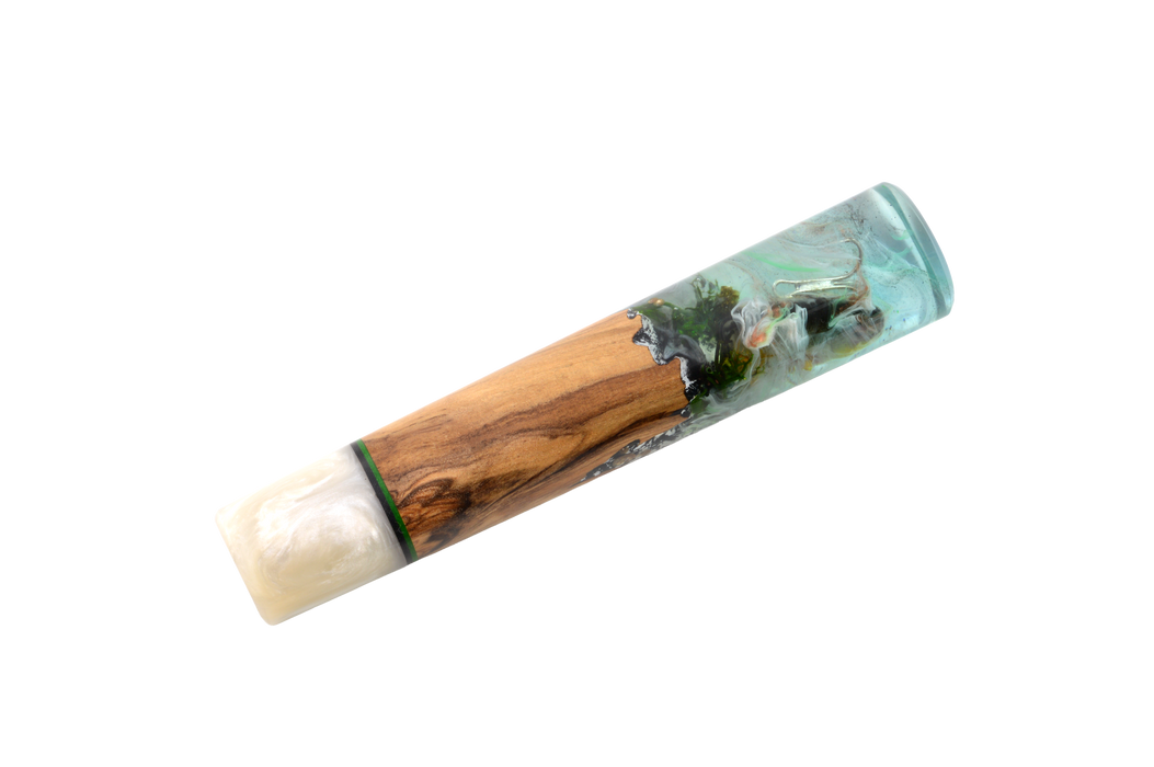 The Custom Wa-Handle #627 - 140mm (Standard) by Made in Turkey features olive wood, resin, and white translucent materials in a sleek cylindrical design, displayed against a white background.