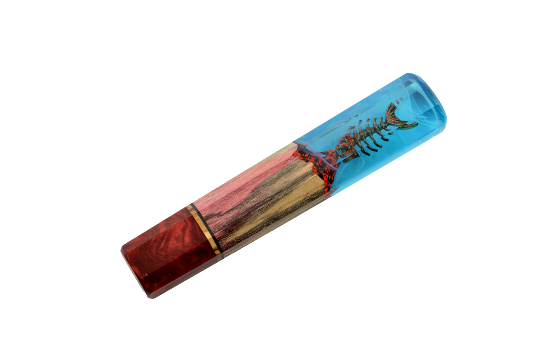 The Custom Wa-Handle #636 - 141mm (Standard) by Made in Turkey showcases red and gold wood with clear blue resin, featuring a detailed miniature lobster—ideal for turning projects or as inspiration for a unique knife handle.