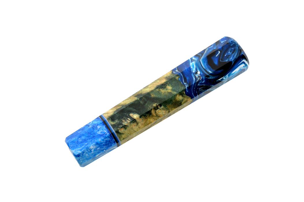 The Made in Turkey Custom Wa-Handle #641 - 140mm (Standard) features a marbled design in blue, black, and gold with swirling patterns on the cap and body, evoking the artistic look of a custom knife handle.